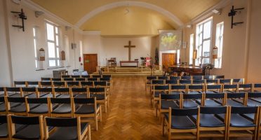 Empty chairs in the church